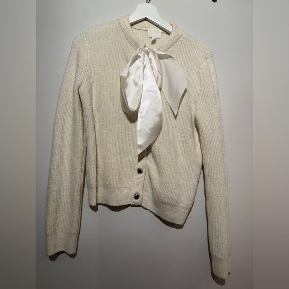 Elegant Cream Sweater with Bow Detail